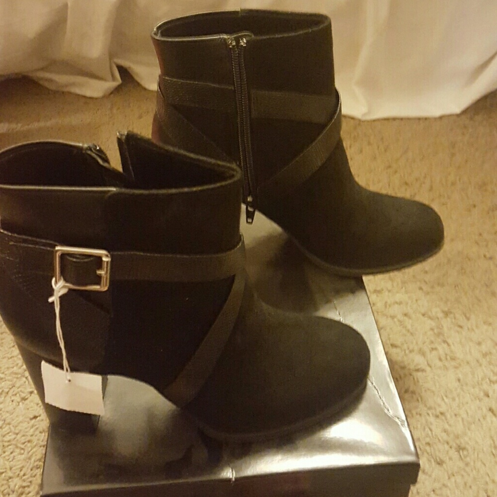 New with tags,  Christian Siriano boots.